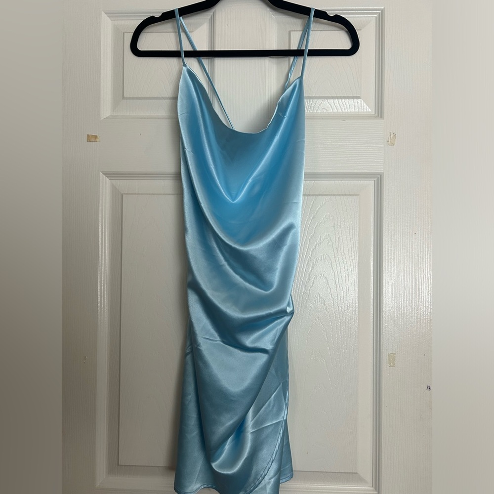 satain in blue mini dress